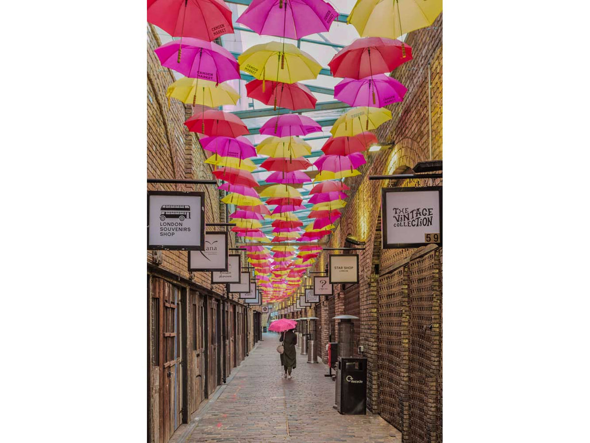 Architectural London - A woman walks under a ceiling of umbrellas, Camden Market (#ARCH_LONDON_20)